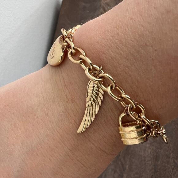 Gold tone charm adjustable charm bracelet- feather, lock, heart, star, moon - Picture 7 of 9